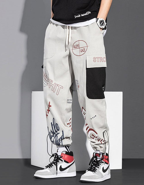 Load image into Gallery viewer, Classic Streetwear Casual Men Ribbons Harem Jogging Pants
